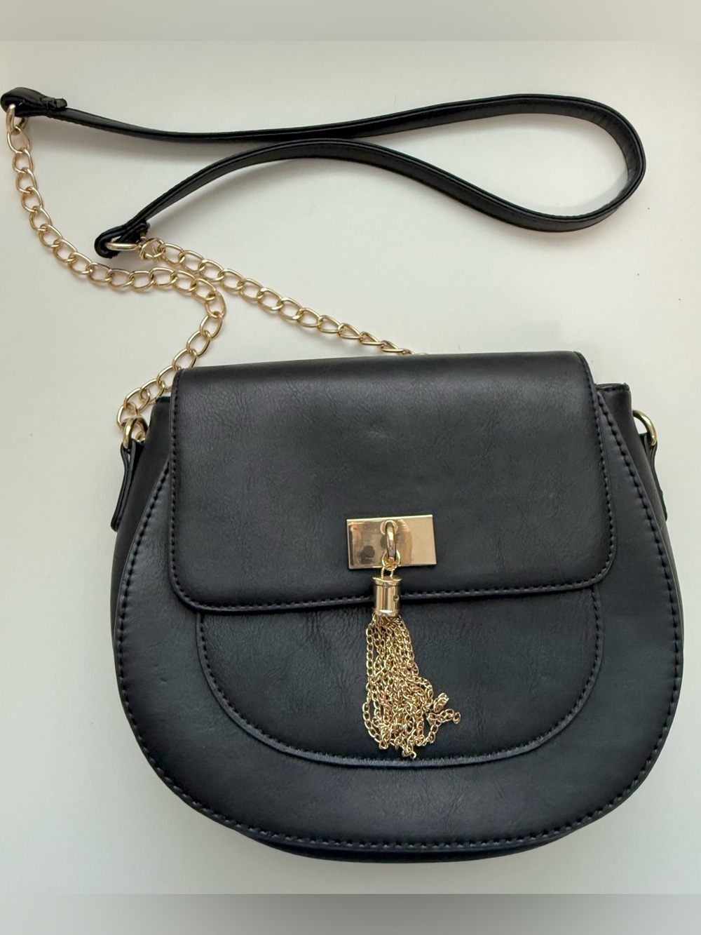 Call It Spring Black Crossbody Saddle Bag with Gold Chain Tassel